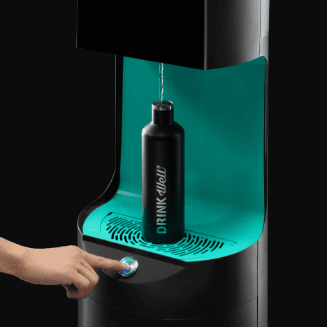 water dispenser dispensing water into a reusable water bottle